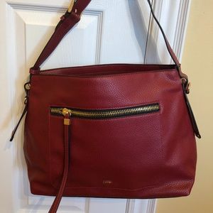 Brand new Dark Wine Red Caprisa handbag